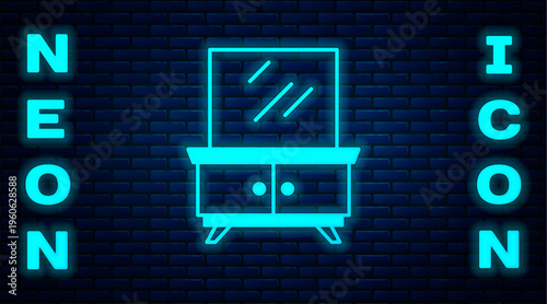 Glowing neon Dressing table icon isolated on brick wall background. Vector