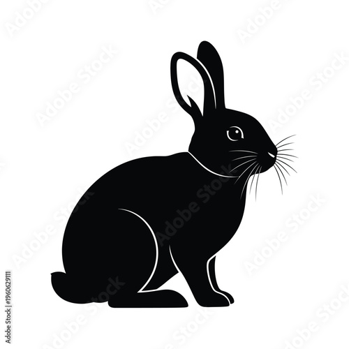 A black silhouette of a rabbit sits facing to the right against a white background.