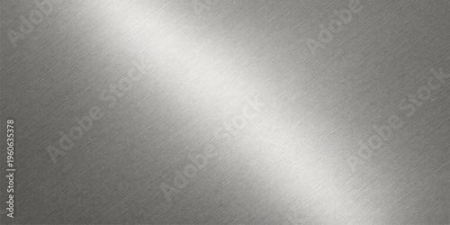 Brushed silver stainless steel plate background featuring a light metallic aluminum surface with a shiny gray textured pattern for a modern material design backdrop