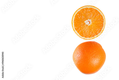 Sliced and whole oranges. White background