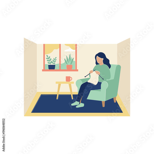A woman sits in a green chair in a room reading a book on her lap by the window.