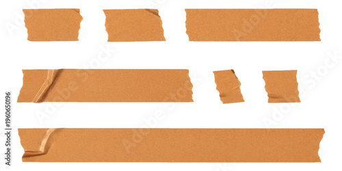 A collection of various lengths of brown paper adhesive tape strips isolated on a white background