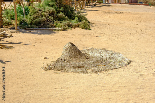 old parasol on the beach