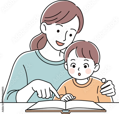 Mother patiently points at book while teaching her young son reading.