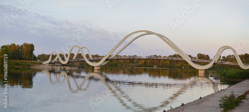 Wave-shaped pedestrian bridge over the Dnipro River to Obolonskyi Island in Kyiv, Ukraine

