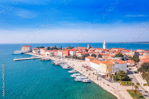 Panorama of coastal town of Porec in Istria, Croatia, with harbor and promenade