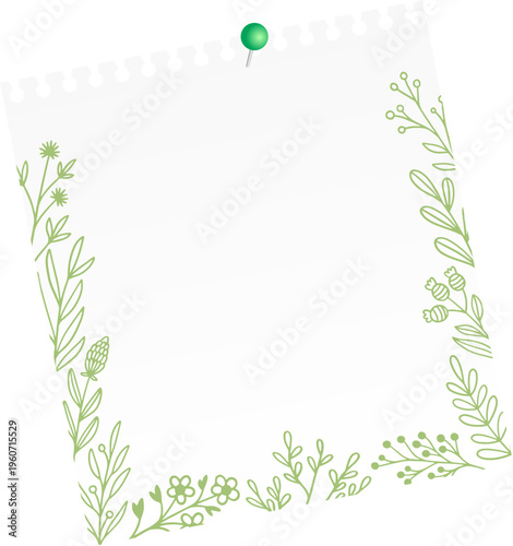 A sheet of paper in a floral frame, secured with a pin