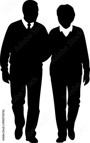 A couple walks together in silhouette.