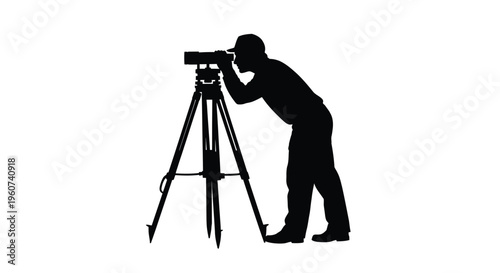 Surveyor using a theodolite and tripod a striking black silhouette