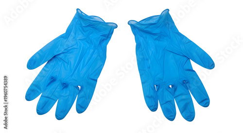 A pair of blue latex gloves on a black background