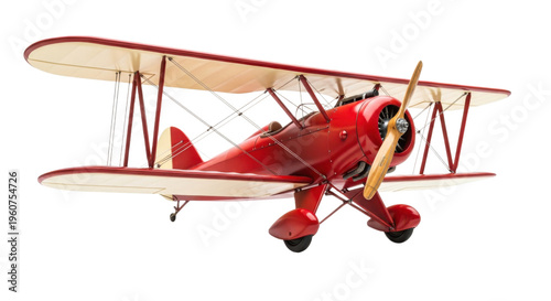 Vintage red biplane model with white wings and wooden propeller on transparent background