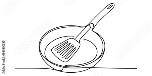 line drawing of frying pan and spatula on countertop