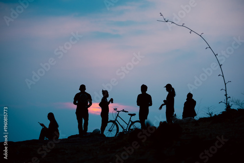 Silhouette group people sun...
