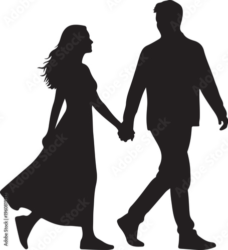 Silhouette of a romantic couple walking hand in hand