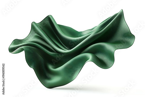 Green flowing fabric creating soft, graceful shapes in the air against white.