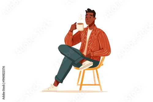 Young african male drinking coffee in casual attire on wooden chair