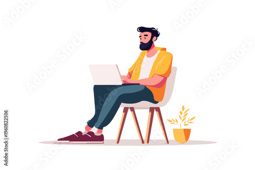 Young hispanic male working on laptop in casual setting with yellow jacket