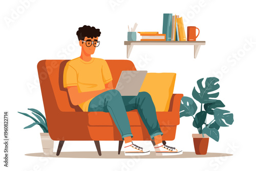 Young male with laptop relaxing on sofa with books and plants