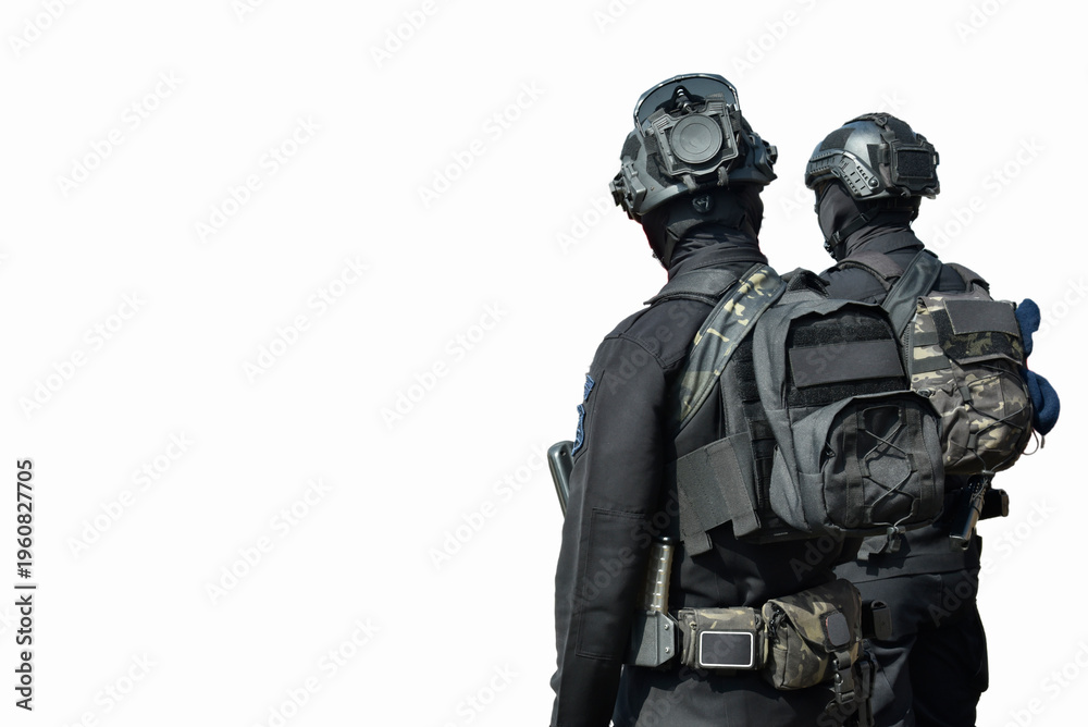 Fototapeta premium Special forces personnel in full tactical gear against a white background. The personnel are seen wearing ballistic helmets, balaclavas, tactical vests with backpacks, and dark tactical fatigues.