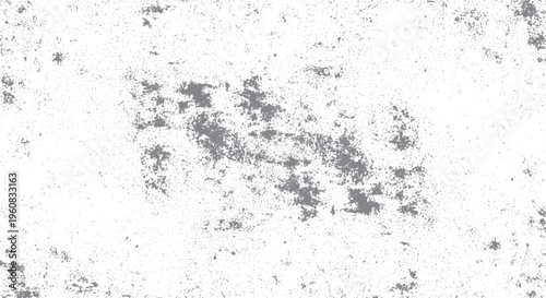 Distressed abstract texture with random gray splotches and specks on white, grunge overlay for weathered design effects