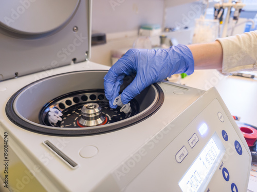 18 March 2026, Brussels, Belgium. Laboratory technician loading Eppendorf tubes into centrifuge during sample preparation