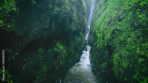 4K Aerial view of Saatsada waterfall in narrow valley in Sahyadri mountain range, Maharashtra, India. Nature landscape. travel, holidays, vacation, trekking and adventure concept. 