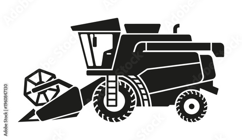 Black combine harvester vector icon. A simple graphic silhouette of agricultural machinery for farming, harvest, or food industry themes. Modern and clean design for logos.