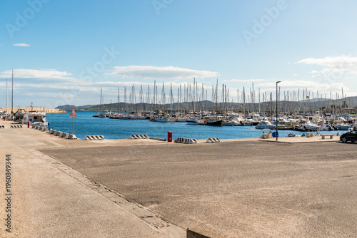 Wallpaper Mural La Caletta harbor in the municipality of Posada, one of the main tourist marinas on the eastern coast of Sardinia, Italy. Mediterranean port with boats and coastal scenery. Torontodigital.ca