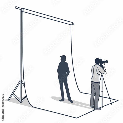 A man standing in front of a backdrop for a photo shoot