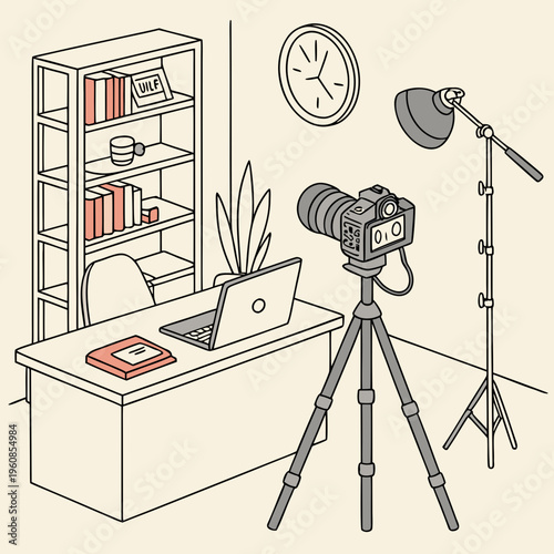 A desk with a laptop and a camera on a tripod