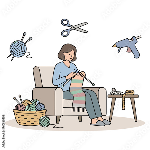 Woman sitting in armchair knitting colorful scarf with yarn balls nearby indoors