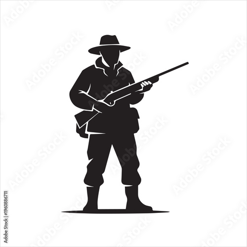 Man wearing a hat holding a rifle standing alone hunting or military concept