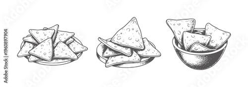 Black and white triangular chips plates and in a bowl snacks food