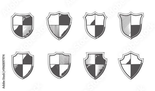 Eight black and white checkered patterned heraldic shields with varied textures
