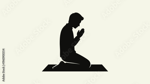 Silhouette of a person kneeling on a prayer mat with hands clasped in a posture of prayer or meditation, isolated on a light background.