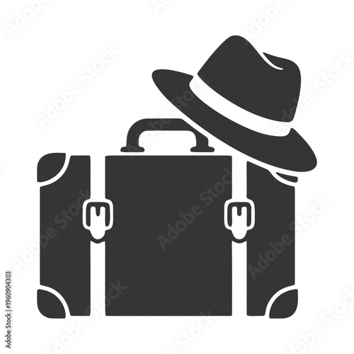 旅行鞄と帽子のシルエットアイコン