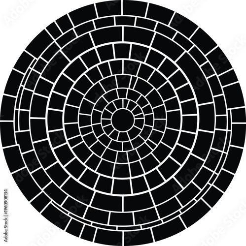 Black and white circular mosaic pattern with concentric arcs of rectangular tiles