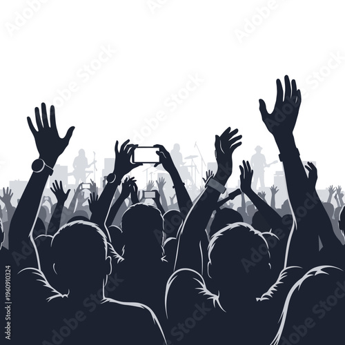 People raising hands in concert crowd.