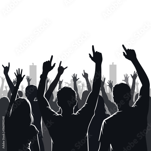People raising hands in concert crowd.