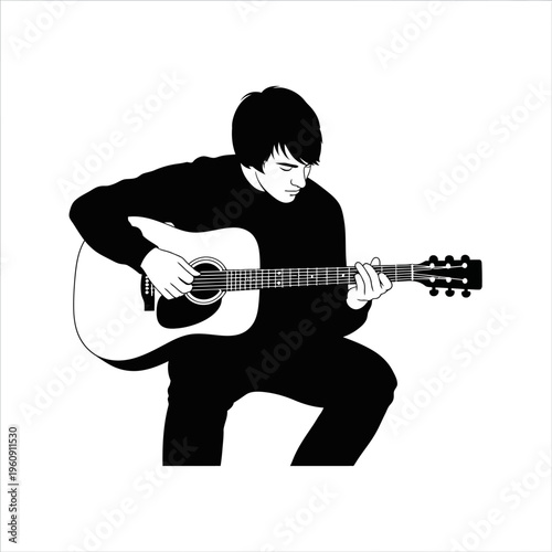 Young man playing acoustic guitar.