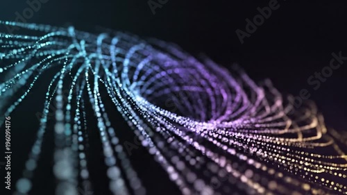 Vibrant multicolored lines and dots swirl in abstract motion against a dark background with glowing streaks of light.