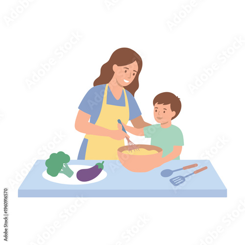 A woman and a boy are cooking together at a table with vegetables.