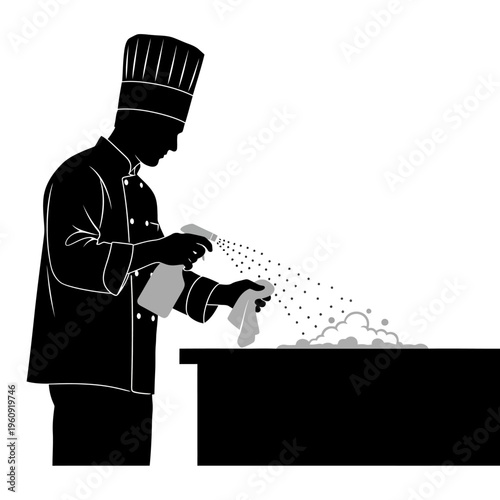 Chef sprinkling seasoning on food.