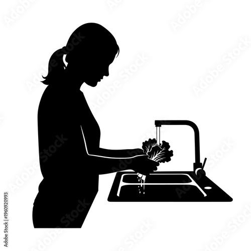 Woman Washing Vegetables in Sink.