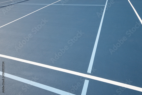 Looking Across a Pickleball Court in Early Morning Sun