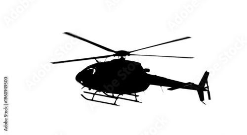 Silhouette of a helicopter flying in the air with rotors spinning