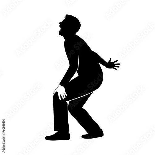 Man bending down in pain silhouette.
