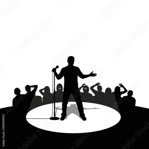 Man singing on a stage microphone.