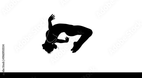 Silhouette of a woman in a dynamic breakdancing pose