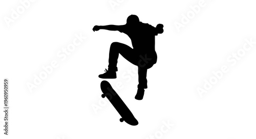 Silhouette of a skateboarder performing a trick with a skateboard